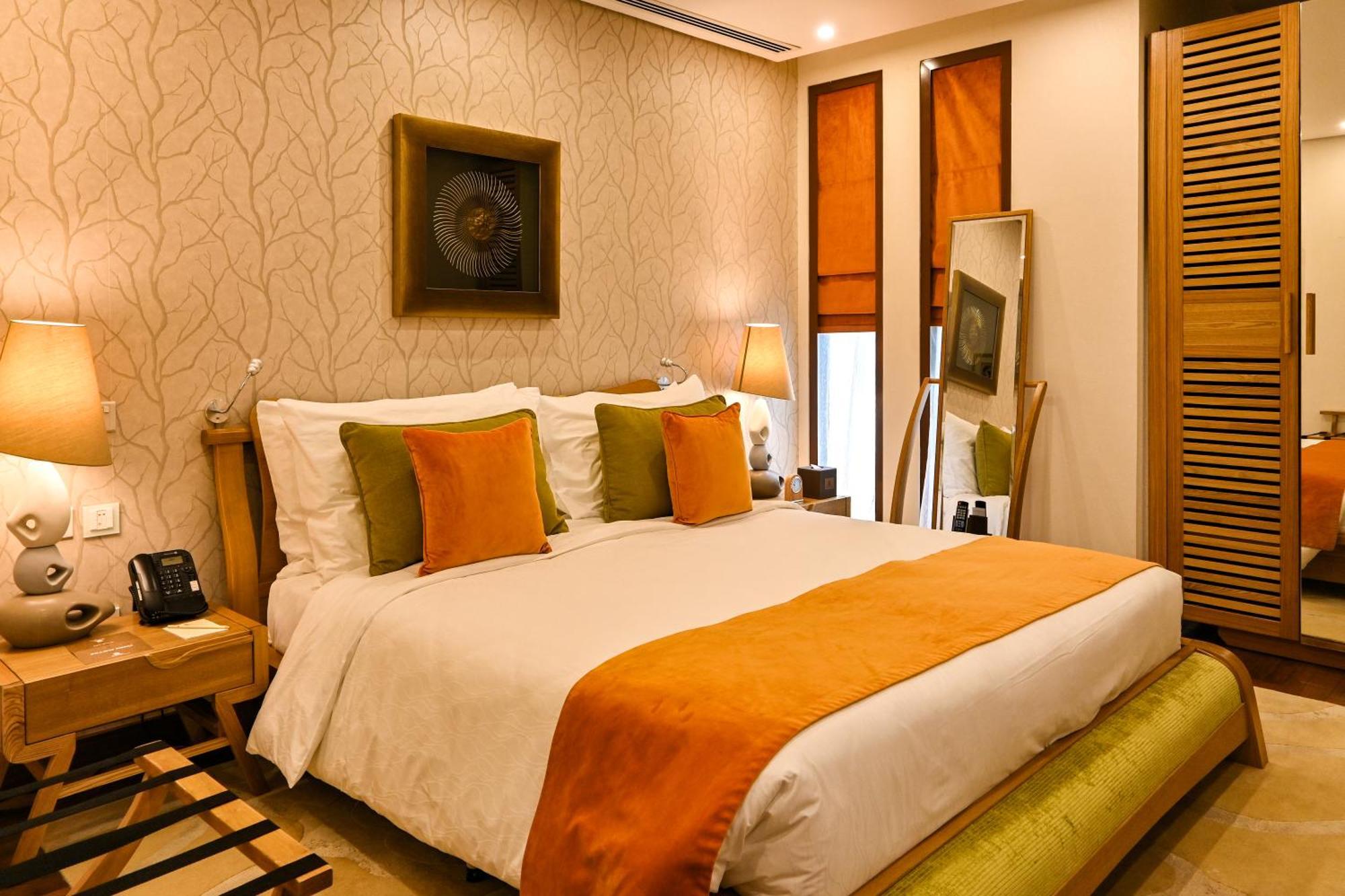 リーフ リゾート マナーマ エクステリア 写真 A bedroom at the Taj Bengal