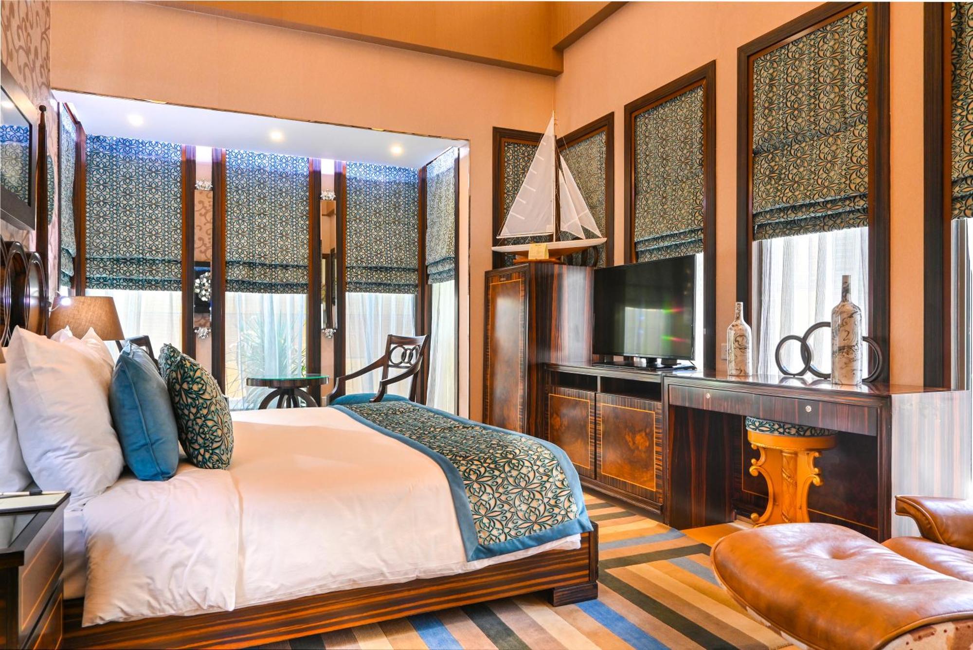 リーフ リゾート マナーマ エクステリア 写真 A bedroom at the resort