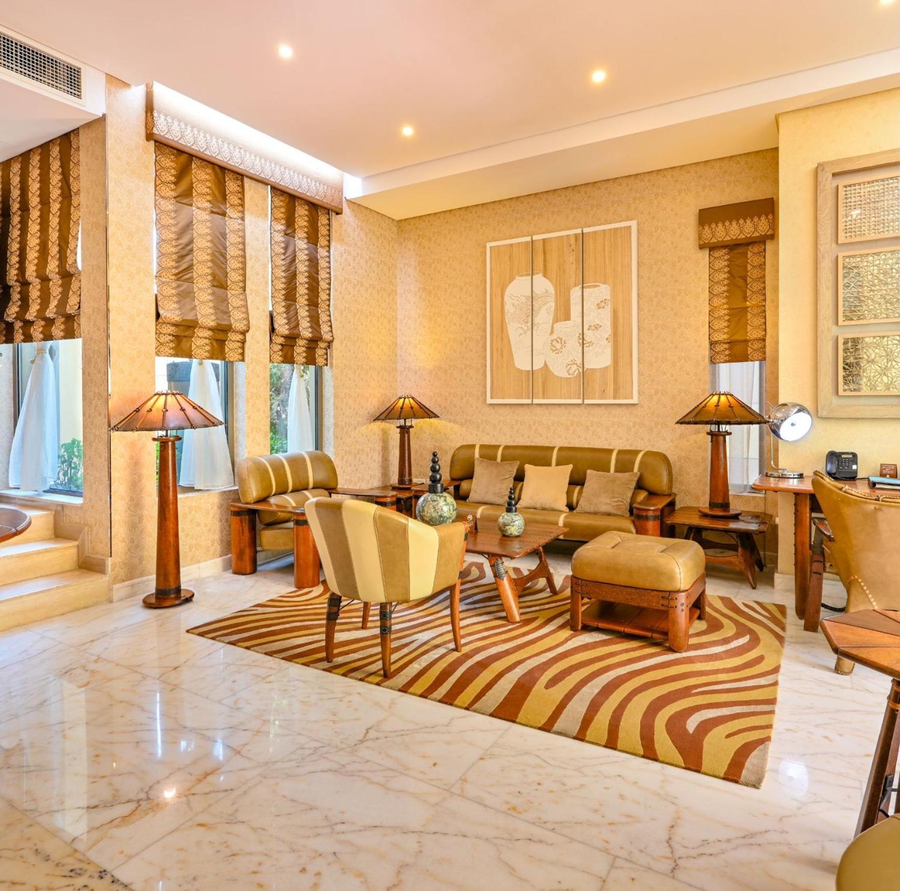 リーフ リゾート マナーマ エクステリア 写真 The interior of a suite at the Taj Mahal Palace, Mumbai