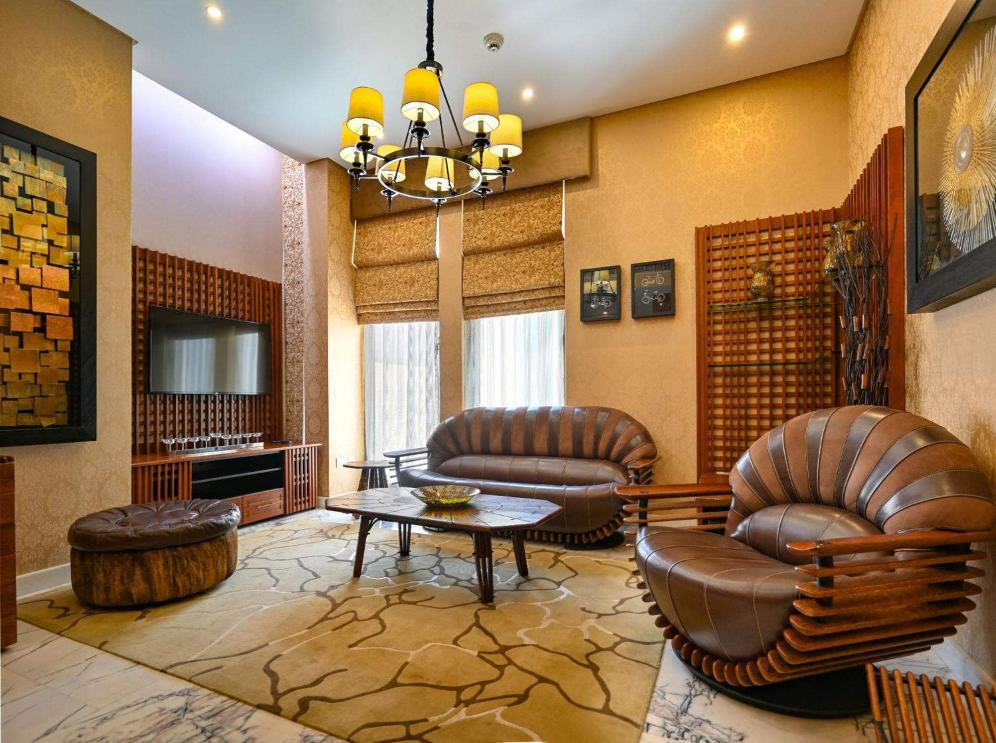 リーフ リゾート マナーマ エクステリア 写真 A living room in a house